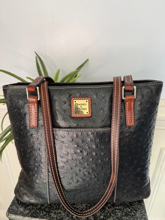 Dooney & Bourke Handbags - Dooney & Bourke Lexington Black Ostrich Style Leather Brown Trim Tote Bag